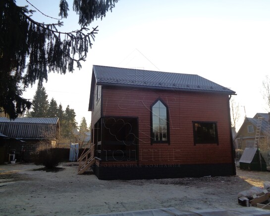 Вид сбоку каркасного дома по проекту ДК-43 в поселке Вырица фото - 8
