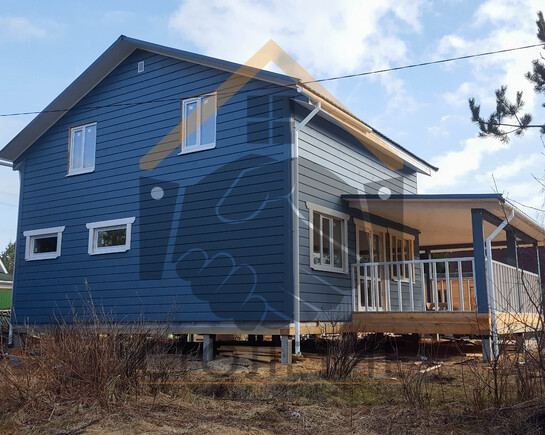 Вид сзади каркасного дома по индивидуальному проекту в снт Здоровье фото 3